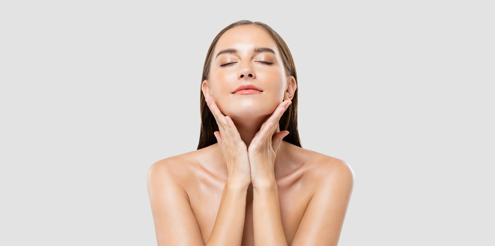 Relaxed woman touching her face
